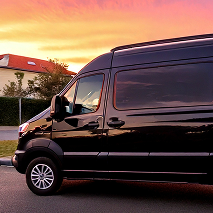 Bosanac black service van parked in a suburban neighborhood. Bosanac black service van parked in a suburban neighborhood.